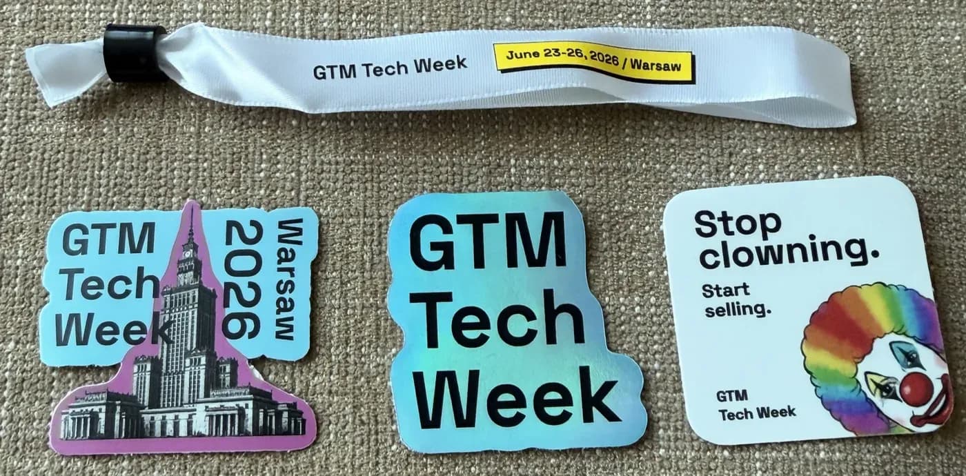 GTM Tech Week wristband and stickers, including the Stop clowning. Start selling. clown sticker